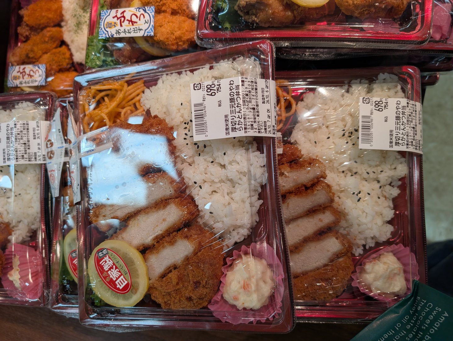 Supermarket bento boxes with pork cutlet and rice